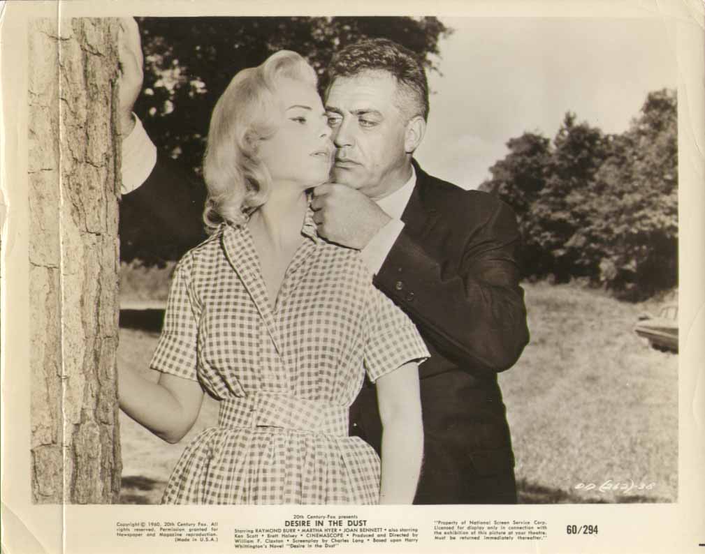 I had to look up the movie: HOLY CRIPES it's RAYMOND BURR gets the pailful o' trouble, evidently